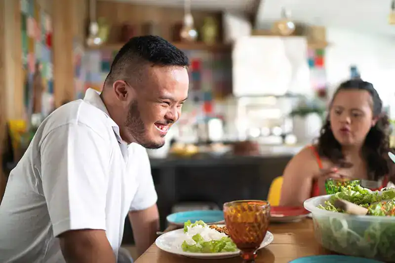 Empowering Weight Loss: A Comprehensive Guide for Individuals with Disabilities 2 Image of a disabled man and balance around nutrition to aid weight loss Newmarket