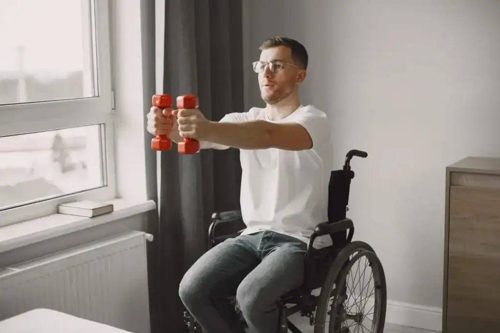 Empowering Weight Loss: A Comprehensive Guide for Individuals with Disabilities 1 Image of man doing exercise in his wheelchair to aid weight loss Newmarket
