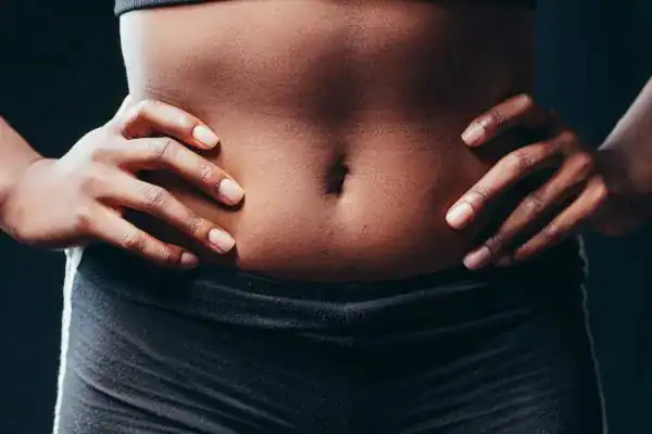 Toning Your Stomach: The Ultimate Guide to Achieving a Sculpted Stomach While Shedding Pounds 1 Image of a toned stomach after non surgical treatment Newmarket